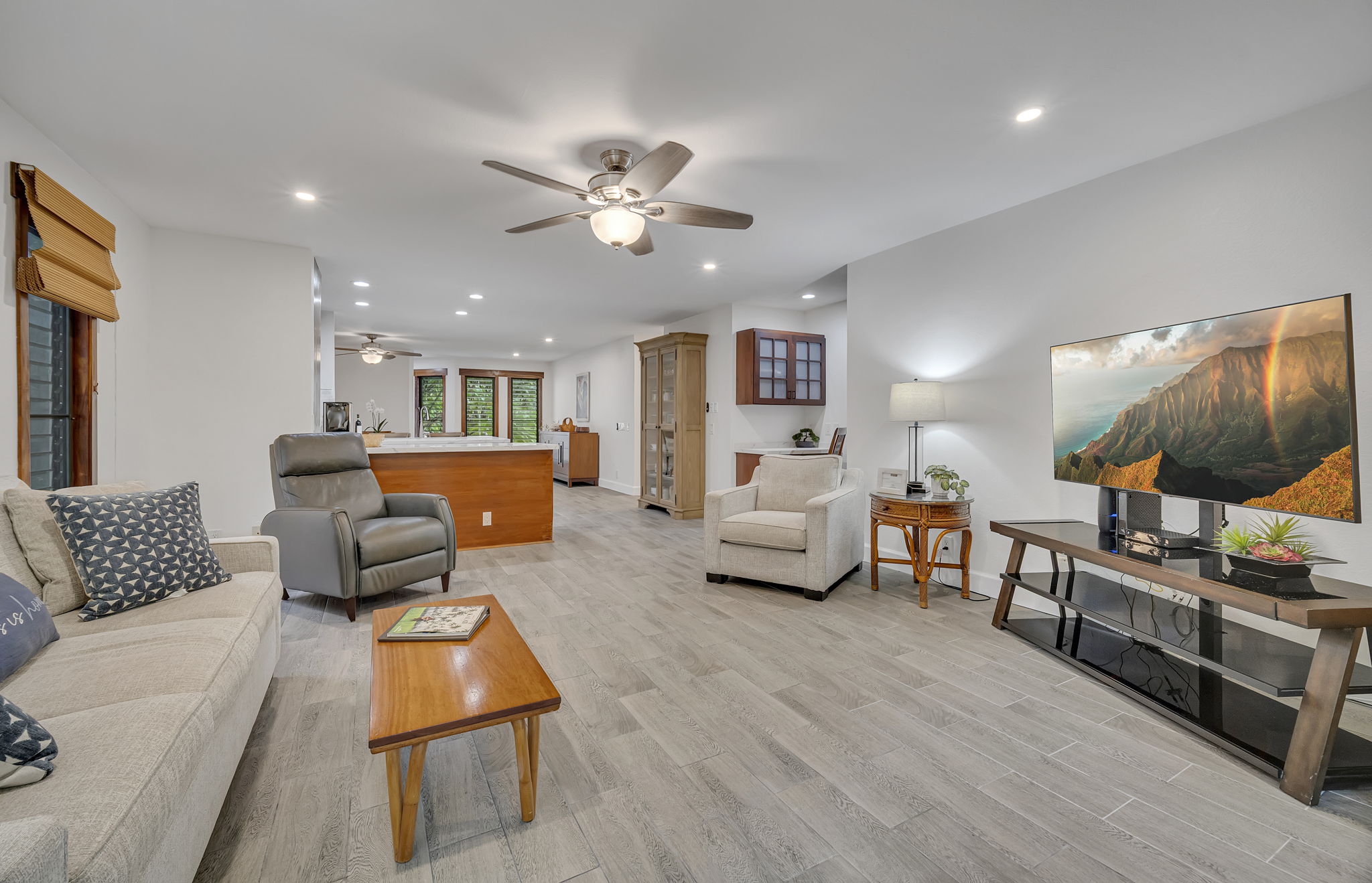 2721 Poipu Road, Unit 420 Koloa, HI 96756 - Photo 8 of 28 a living room with furniture and a flat screen tv