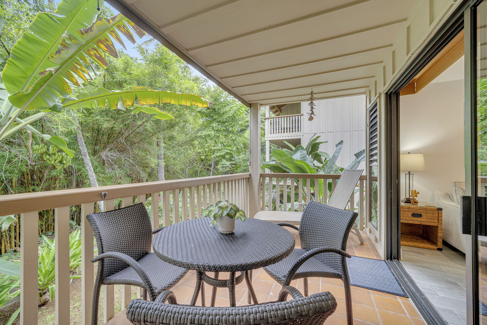 2721 Poipu Road, Unit 420 Koloa, HI 96756 - Photo 10 of 28 a view of a porch with furniture and a yard