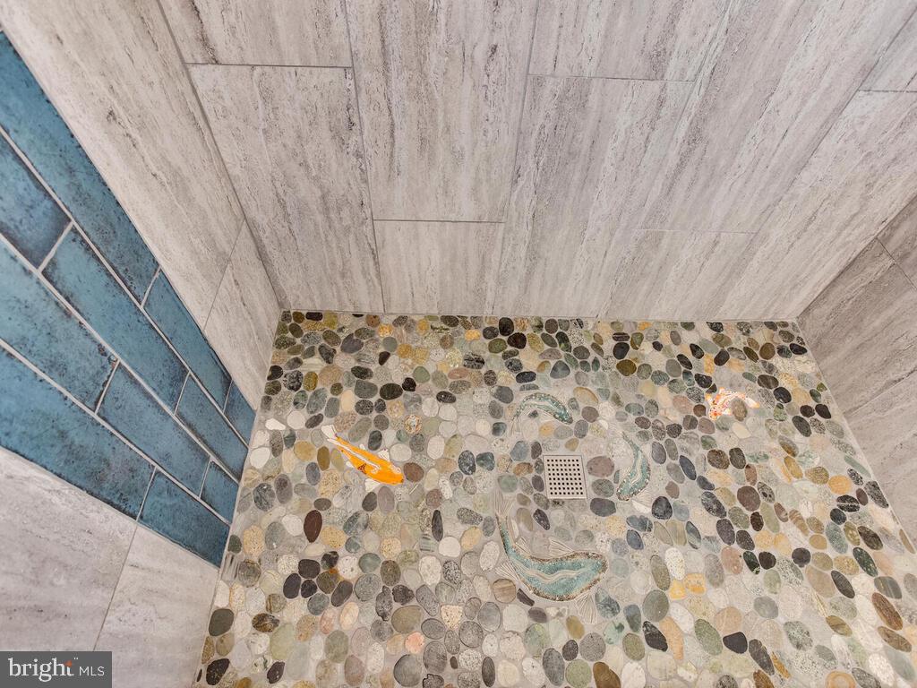 1501 Fullerton Road Edgewater, MD 21037 - Photo 26 of 59 Cut River Stone w/porcelain tile and ceramic koi