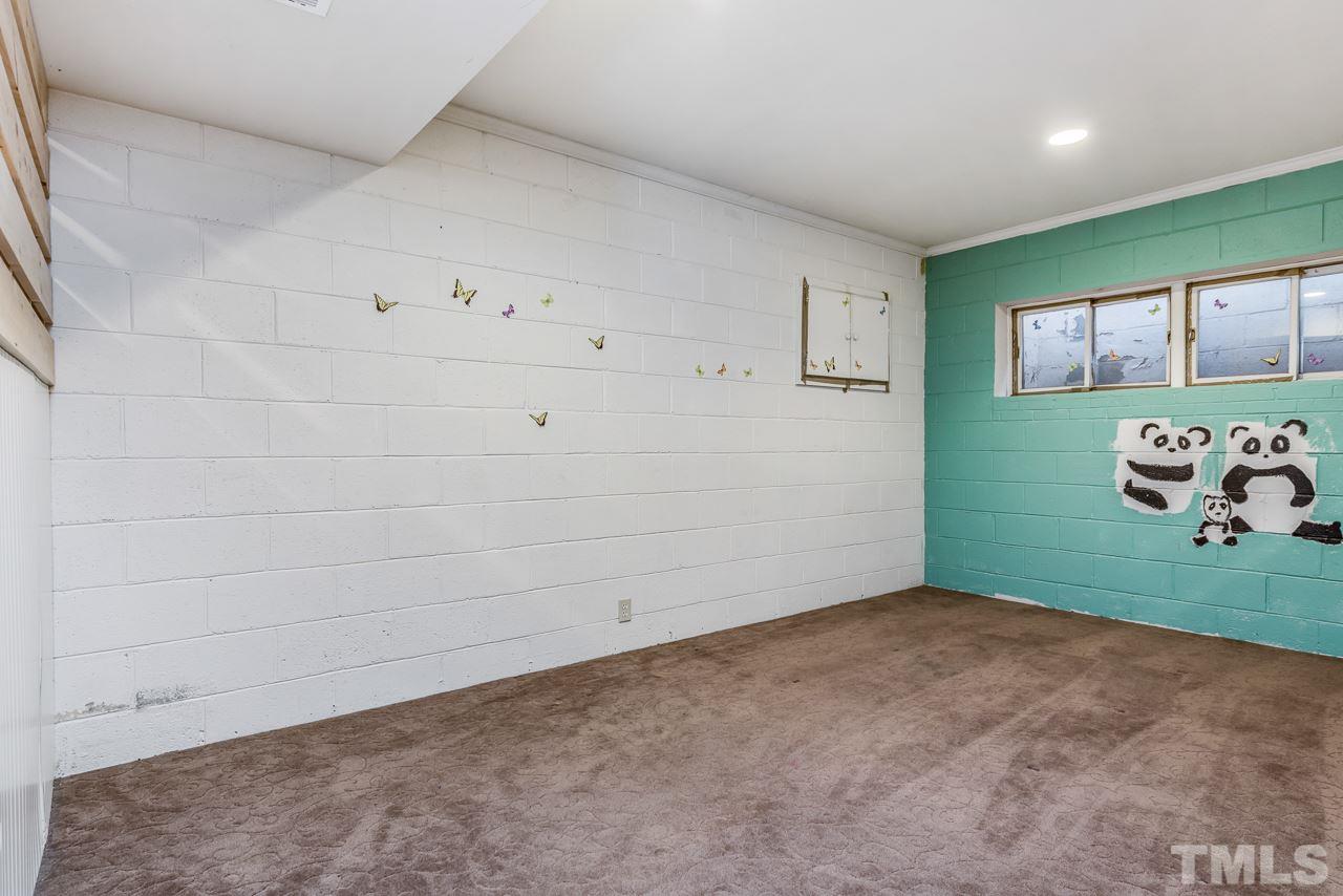 10217 Creedmoor Road Raleigh, NC 27615 - Photo 14 of 24 a view of a room with toys