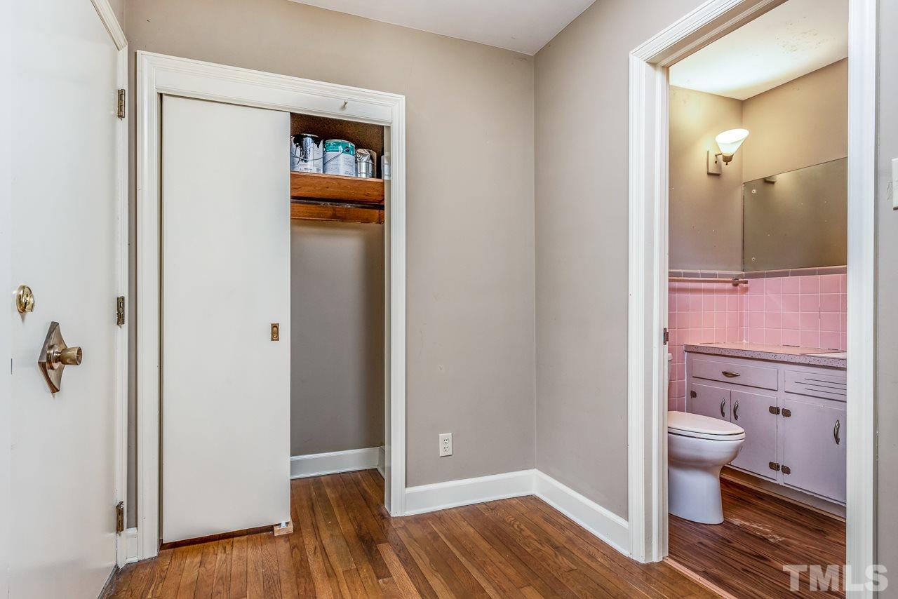 10217 Creedmoor Road Raleigh, NC 27615 - Photo 8 of 24 a bathroom with a sink and a toilet