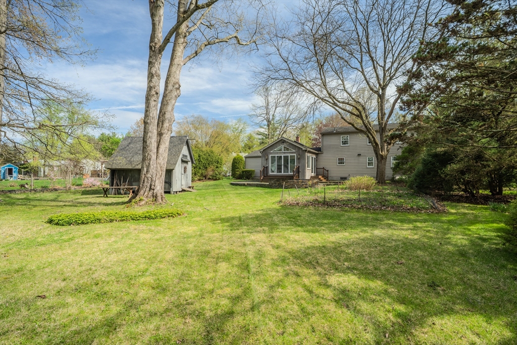 199 Glendale Road Amherst, MA 01002 - Photo 13 of 42 a view of a fountain in front of the house