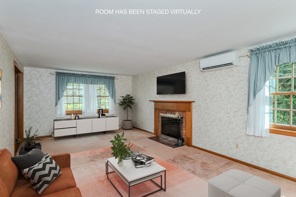 199 Glendale Road Amherst, MA 01002 - Photo 15 of 42 a living room with furniture and a fireplace