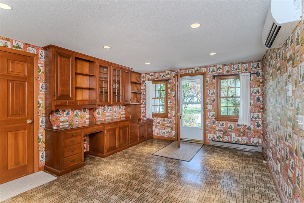 199 Glendale Road Amherst, MA 01002 - Photo 26 of 42 a spacious bedroom with a large bed and a window