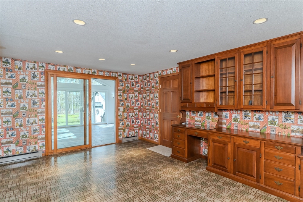 199 Glendale Road Amherst, MA 01002 - Photo 27 of 42 a view of kitchen with stainless steel appliances granite countertop a refrigerator and a sink
