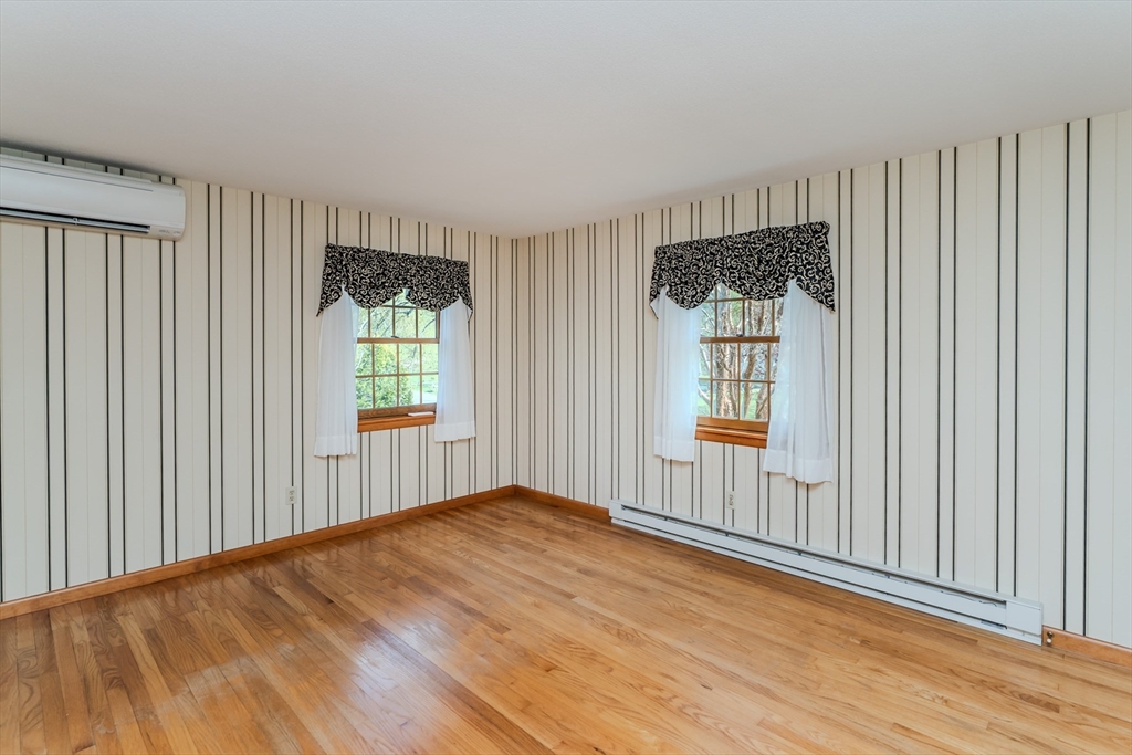 199 Glendale Road Amherst, MA 01002 - Photo 32 of 42 wooden floor in an empty room with a window