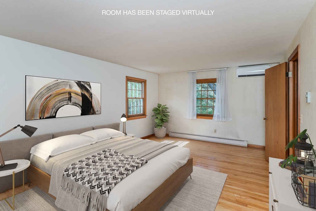 199 Glendale Road Amherst, MA 01002 - Photo 37 of 42 a bedroom with a large bed and a window