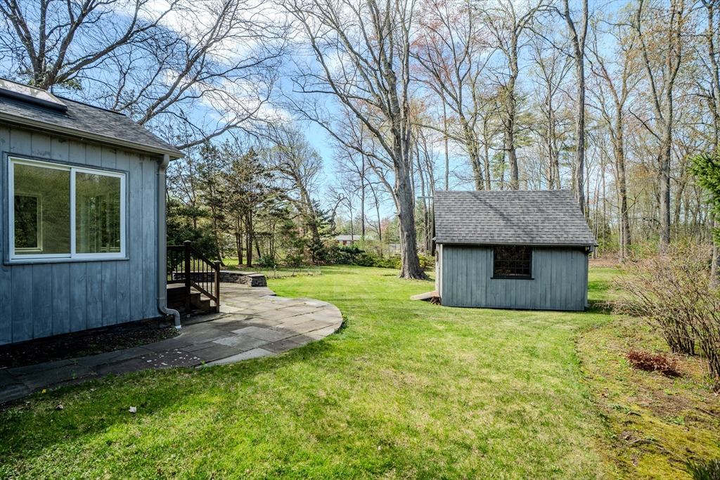 199 Glendale Road Amherst, MA 01002 - Photo 6 of 42 a view of a house with backyard and sitting area