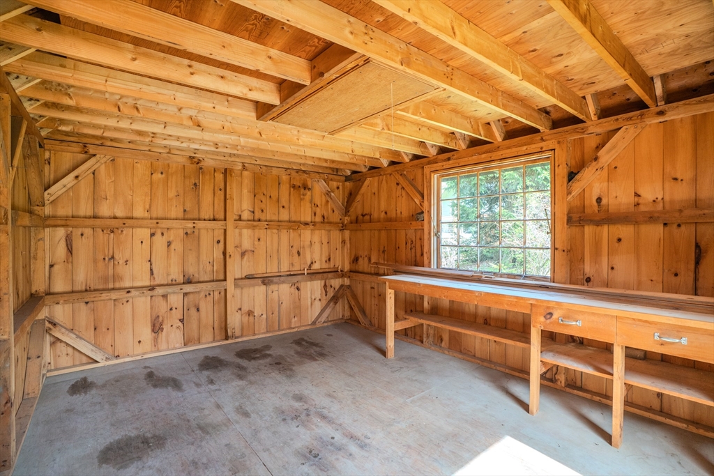 199 Glendale Road Amherst, MA 01002 - Photo 8 of 42 a view of a garage with wooden walls