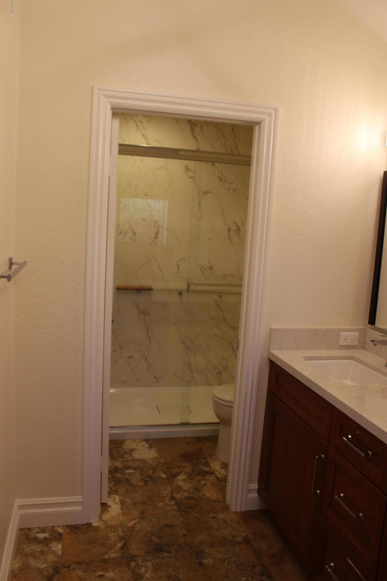 605 Galloping Hill Road Simi Valley, CA 93065 - Photo 14 of 35 a bathroom with a granite countertop sink and a mirror