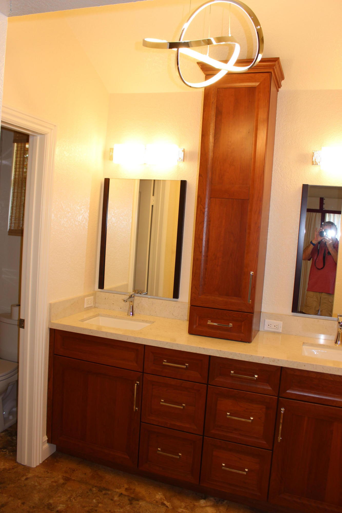 605 Galloping Hill Road Simi Valley, CA 93065 - Photo 15 of 35 a bathroom with a sink and a mirror