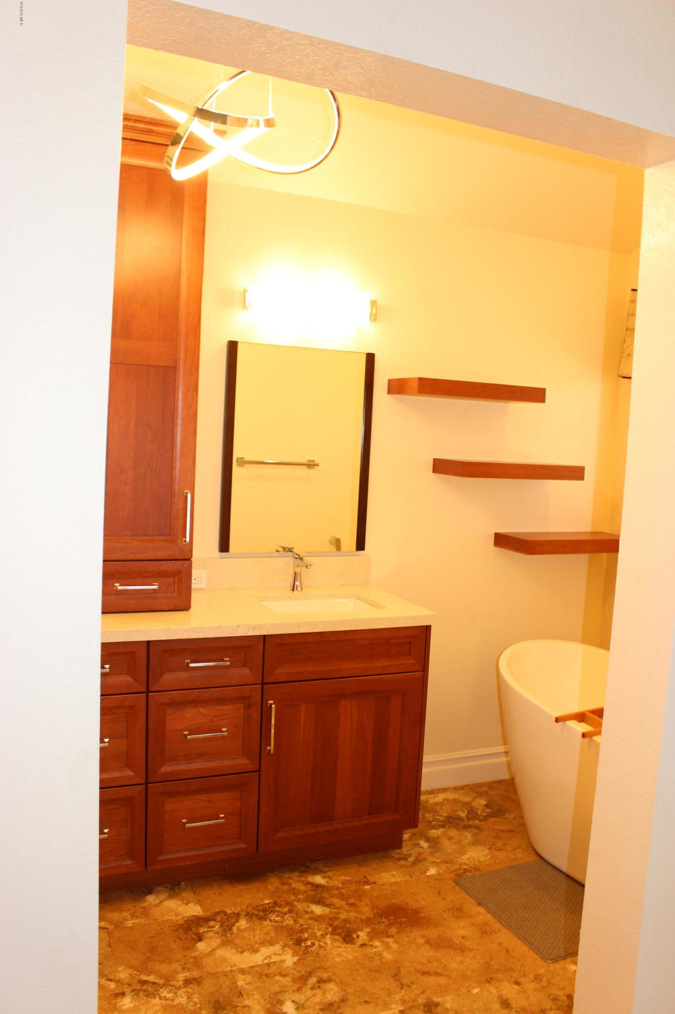 605 Galloping Hill Road Simi Valley, CA 93065 - Photo 16 of 35 a bathroom with a sink and a mirror