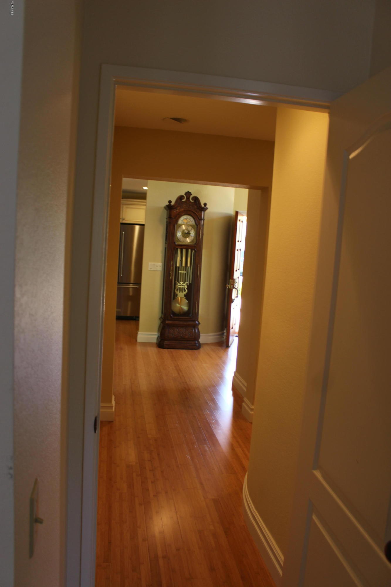 605 Galloping Hill Road Simi Valley, CA 93065 - Photo 18 of 35 a view of a hallway with wooden floor