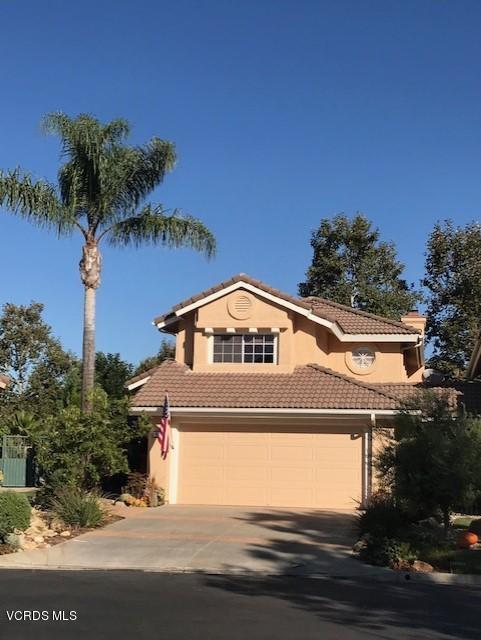 605 Galloping Hill Road Simi Valley, CA 93065 - Photo 3 of 35 a front view of a house with a yard