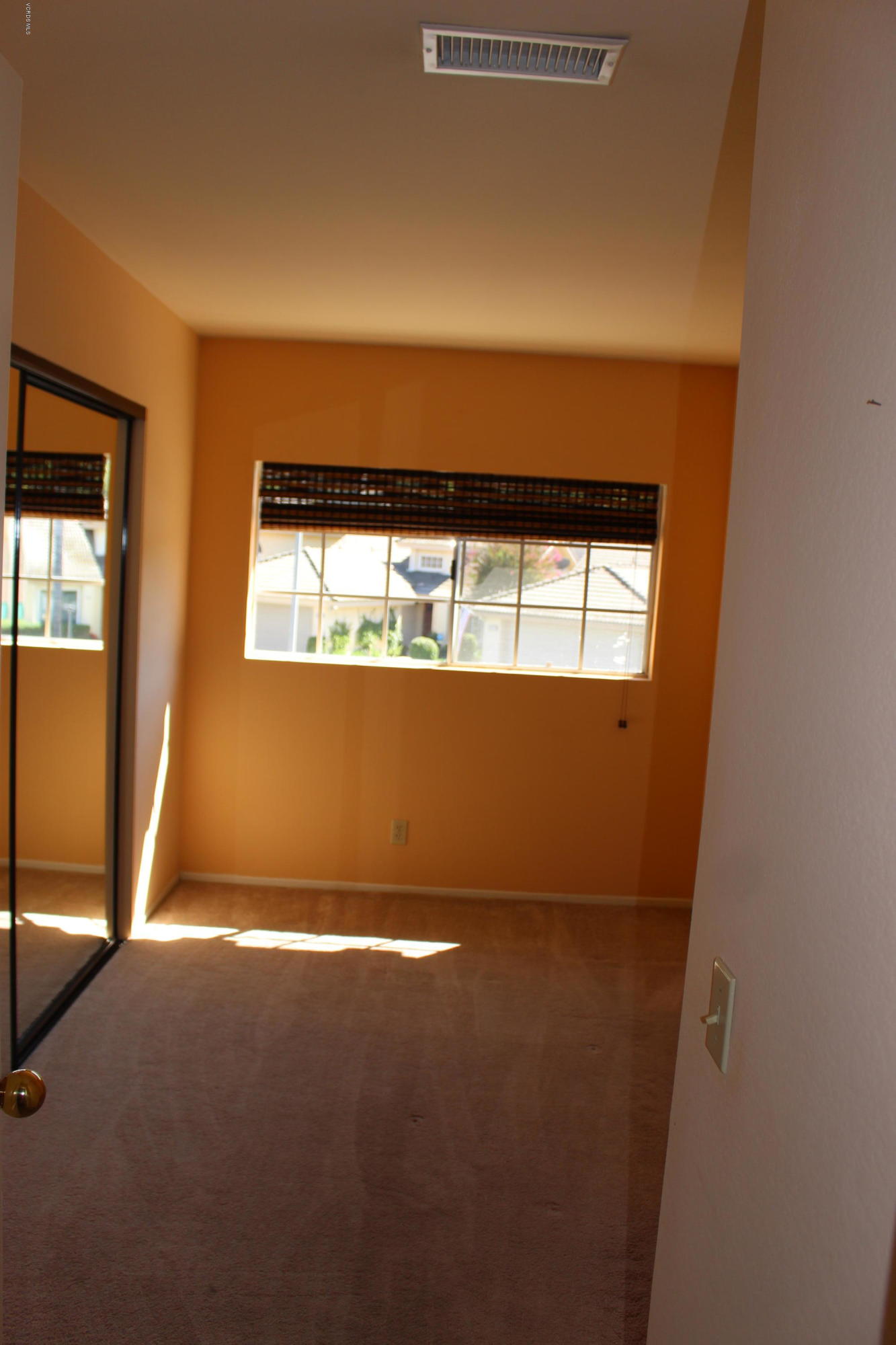 605 Galloping Hill Road Simi Valley, CA 93065 - Photo 21 of 35 an empty room with windows