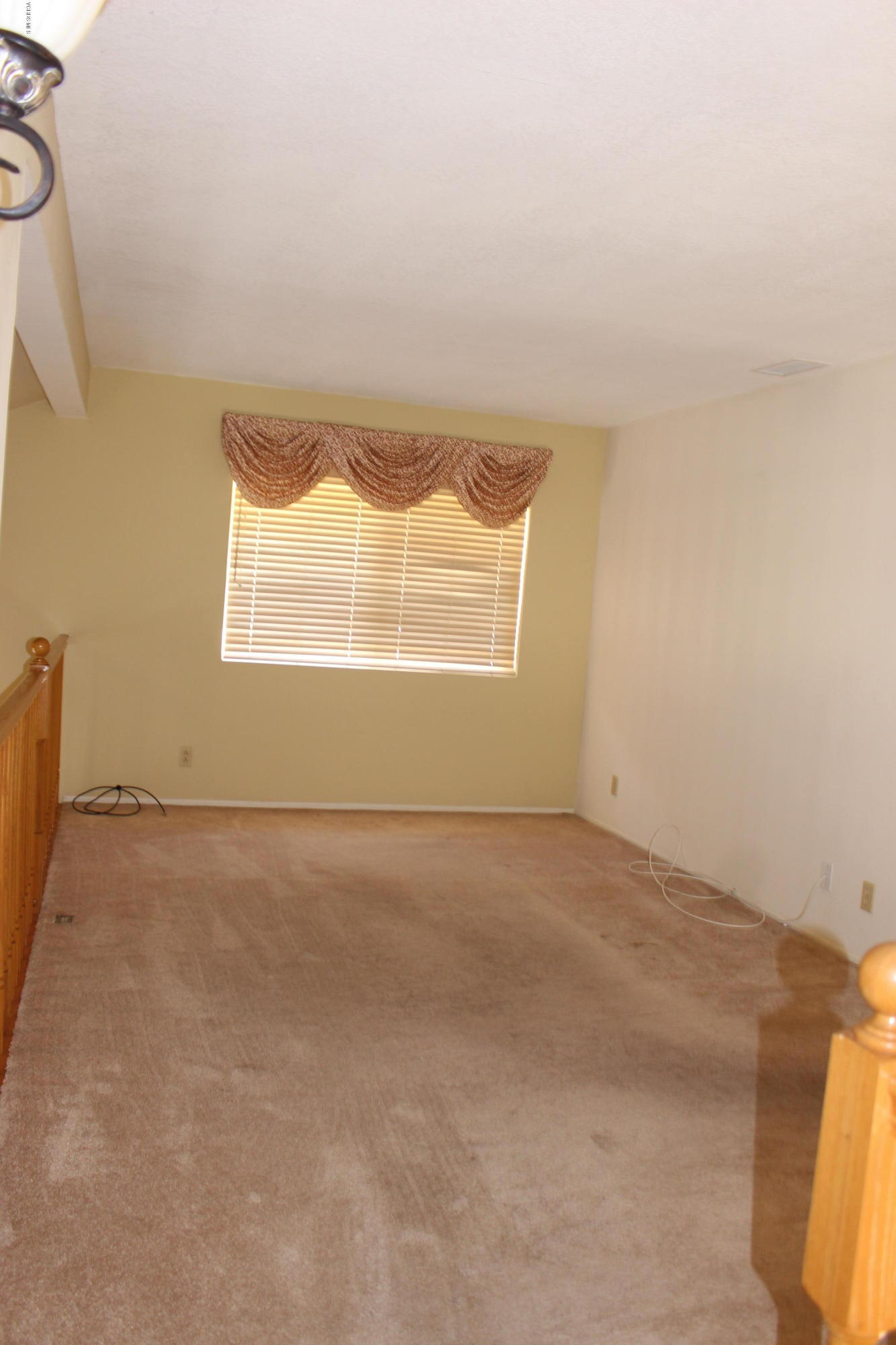 605 Galloping Hill Road Simi Valley, CA 93065 - Photo 22 of 35 an empty room with a window