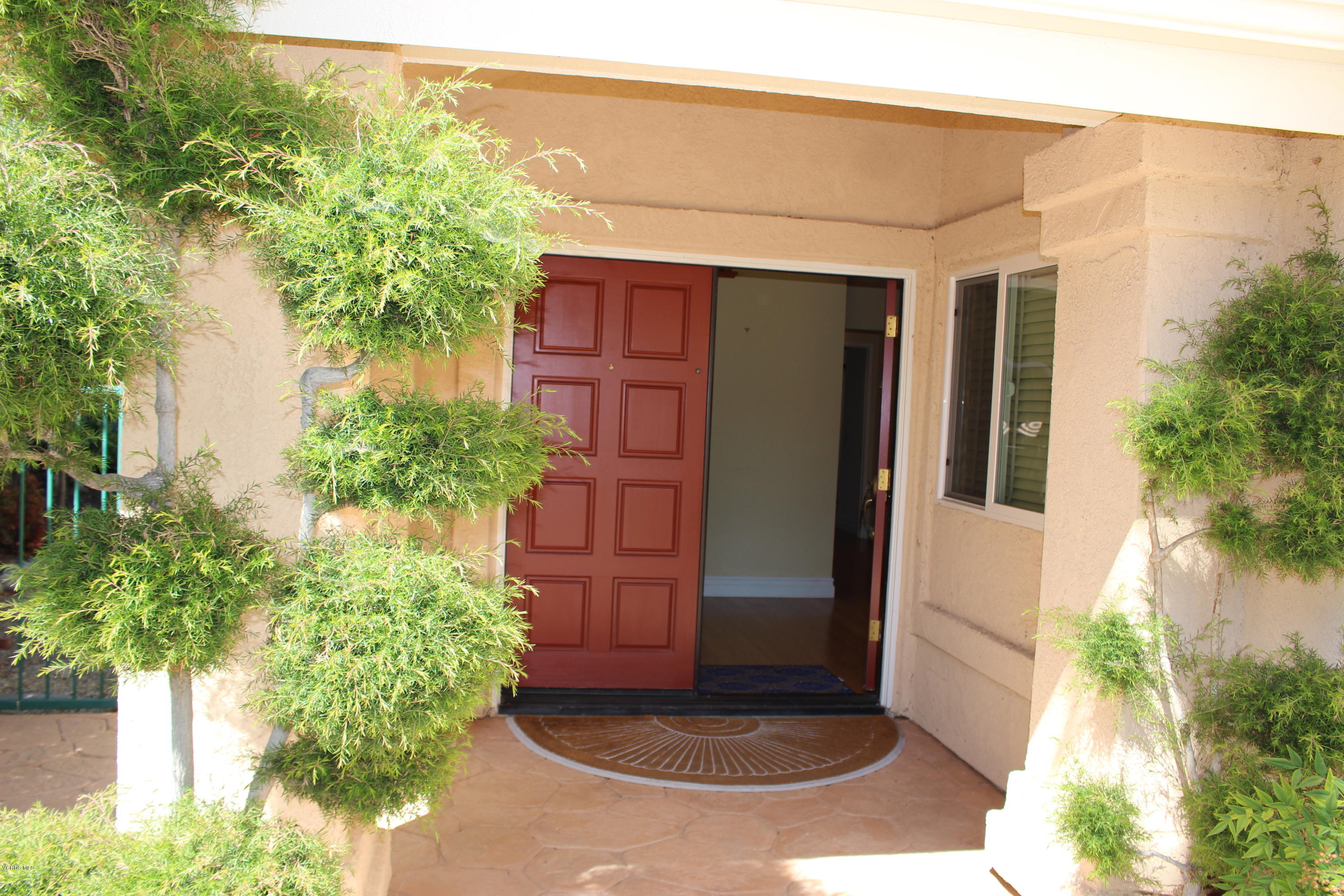 605 Galloping Hill Road Simi Valley, CA 93065 - Photo 4 of 35 a view of a back yard of the house