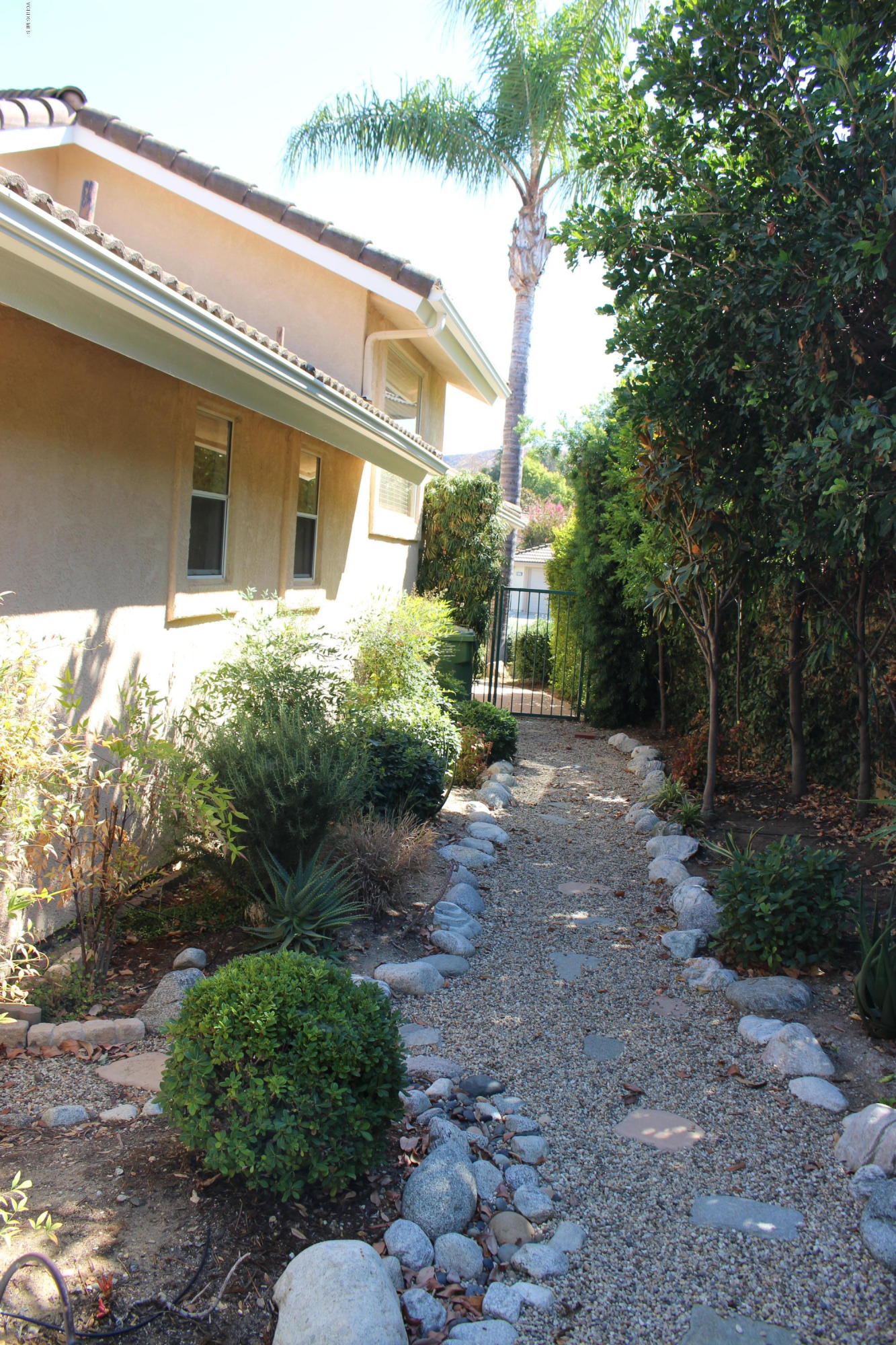605 Galloping Hill Road Simi Valley, CA 93065 - Photo 31 of 35 a front view of a house with a yard
