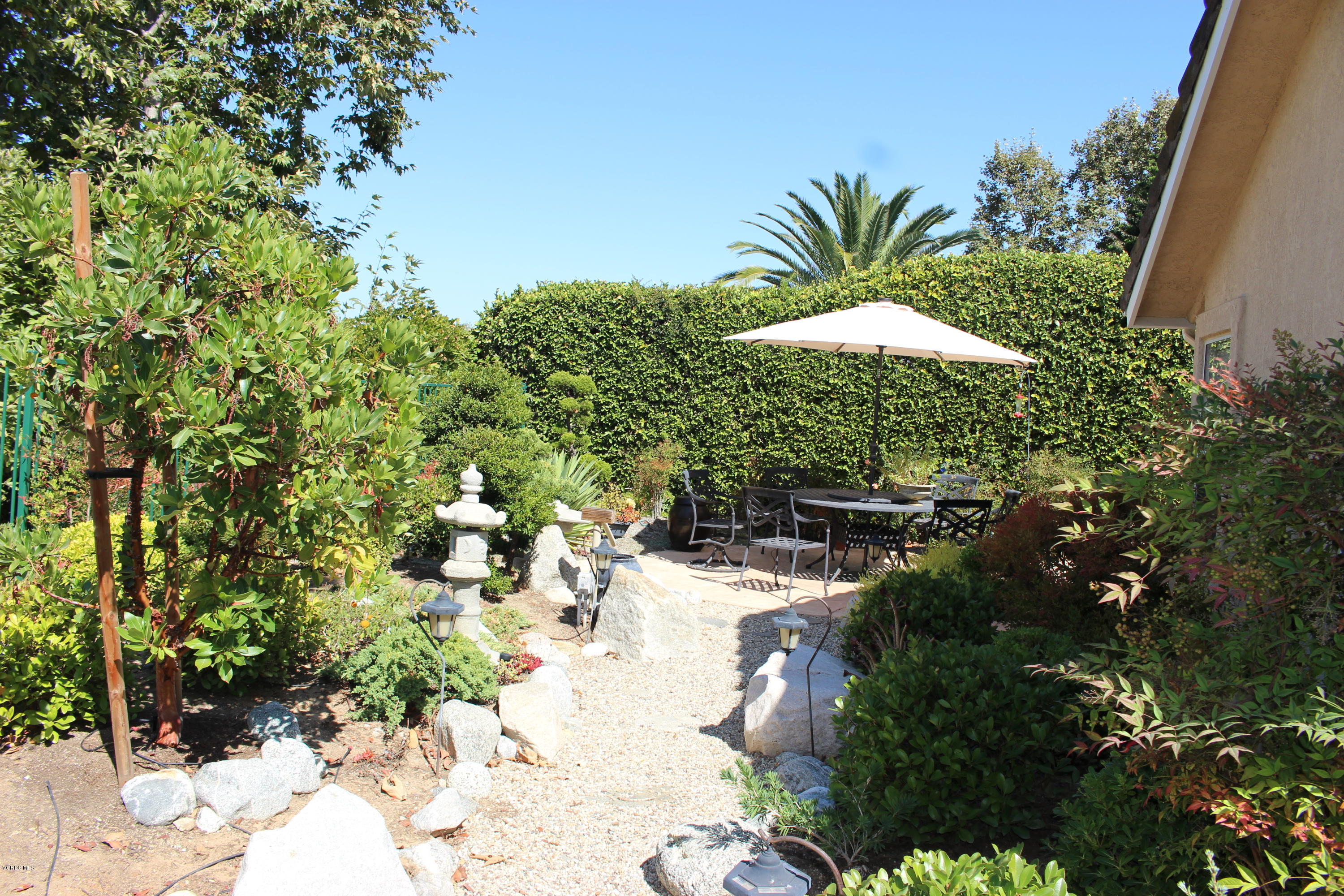 605 Galloping Hill Road Simi Valley, CA 93065 - Photo 35 of 35 a view of a backyard with plants and flowers