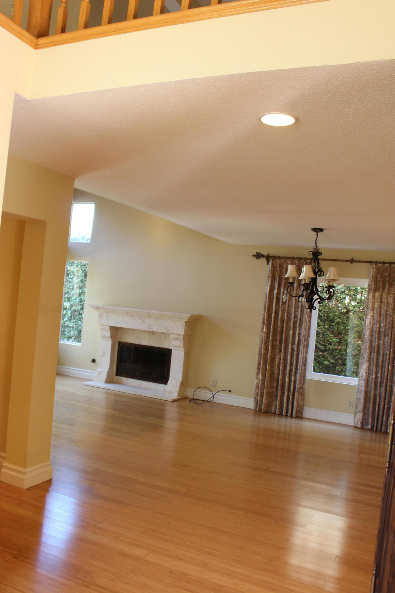 605 Galloping Hill Road Simi Valley, CA 93065 - Photo 7 of 35 a view of a livingroom with wooden floor
