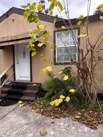 a view of yard along with trees