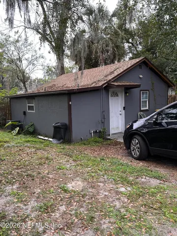 a house view with a garden space