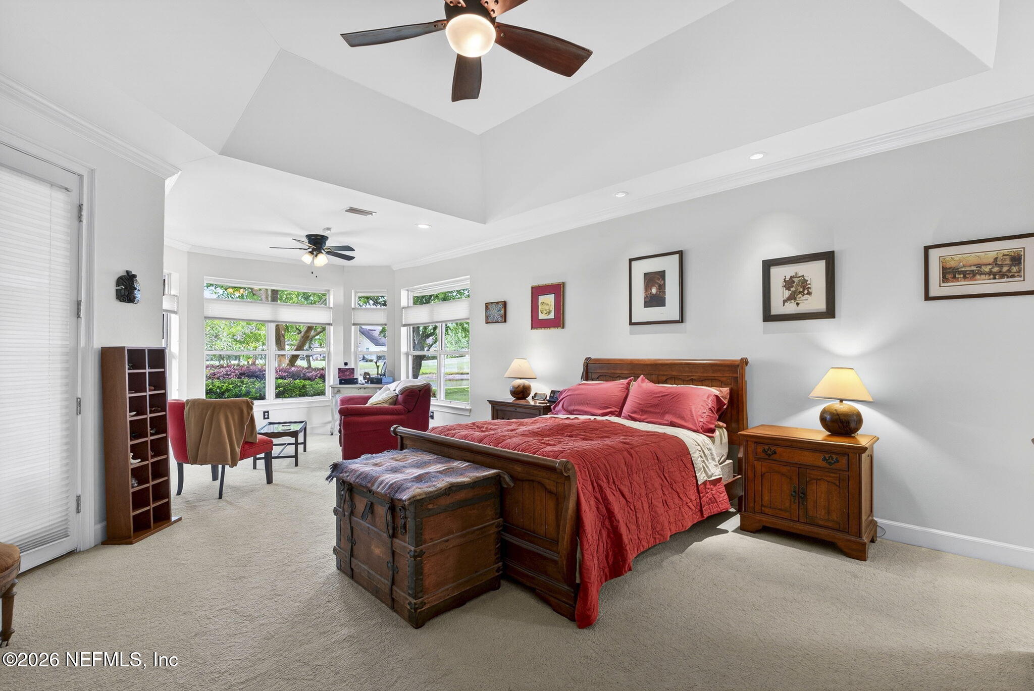 7914 Mc Laurin Road North Jacksonville, FL 32256 - Photo 16 of 44 a bed room with a bed and a large window