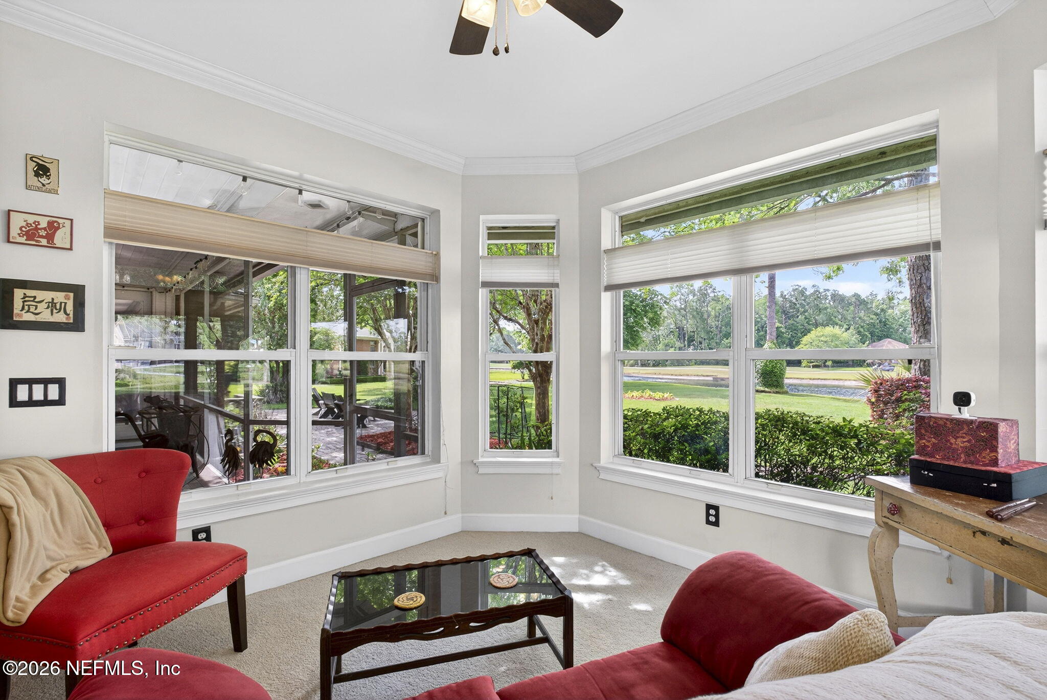 7914 Mc Laurin Road North Jacksonville, FL 32256 - Photo 17 of 44 a living room with furniture and a large window