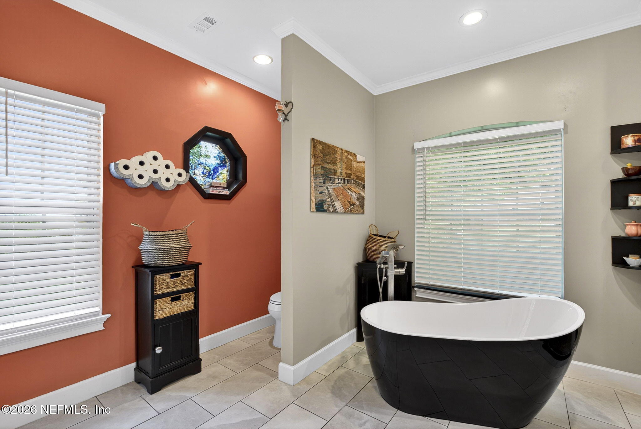 7914 Mc Laurin Road North Jacksonville, FL 32256 - Photo 20 of 44 a bathroom with a sink and a mirror
