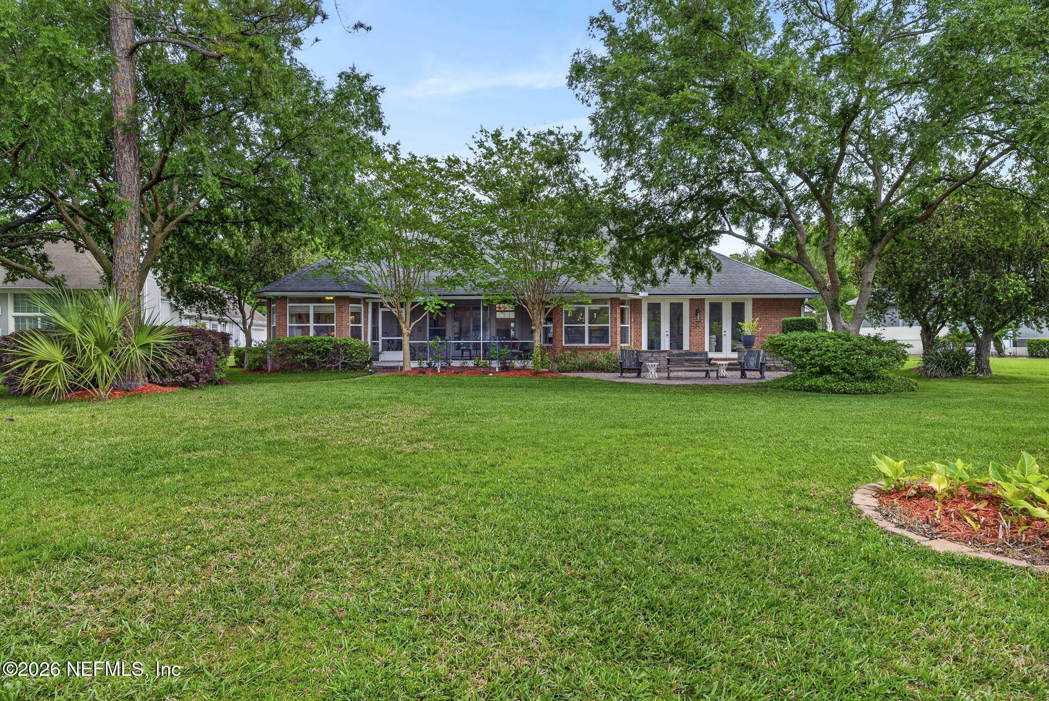 7914 Mc Laurin Road North Jacksonville, FL 32256 - Photo 2 of 44 a view of a house with a big yard