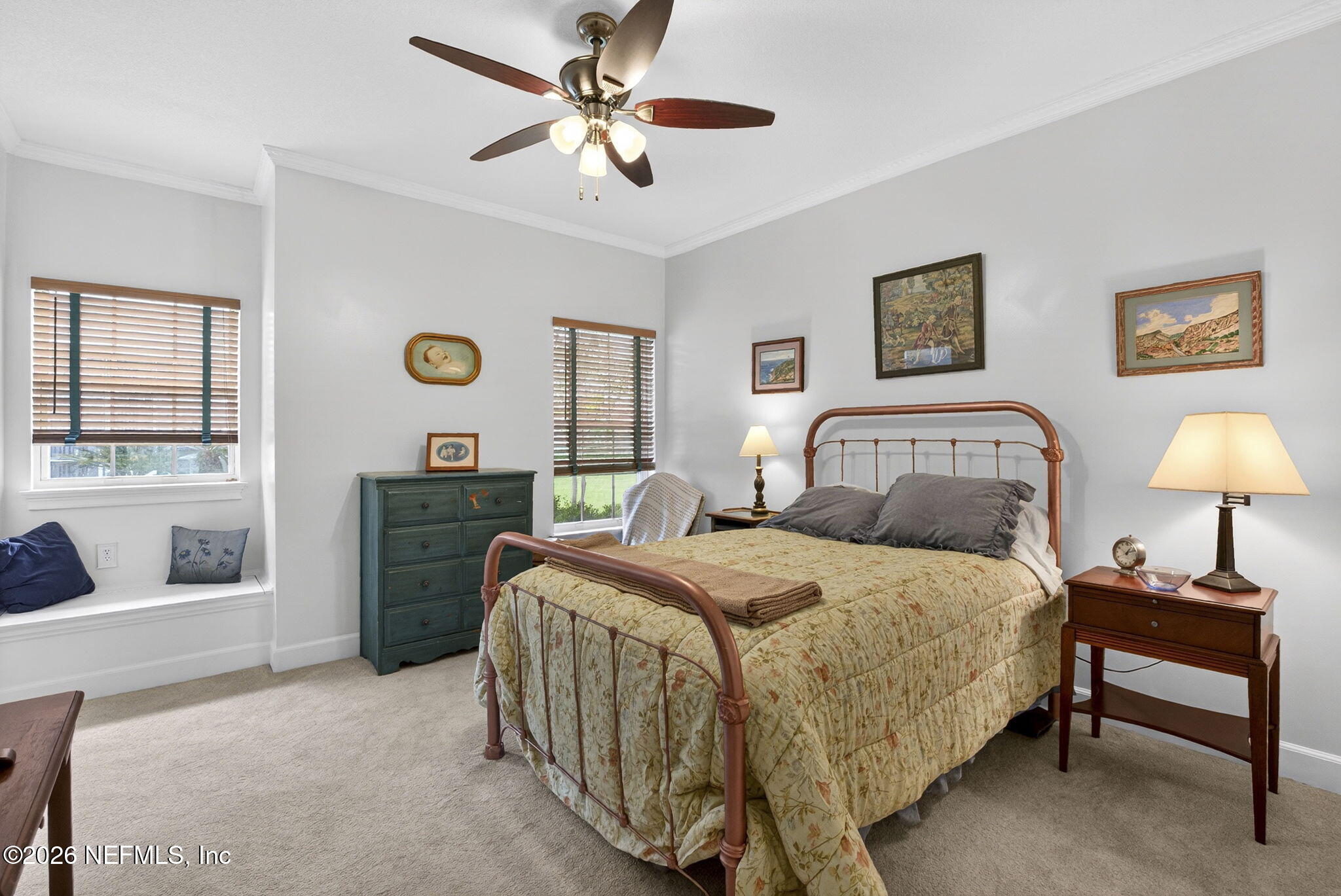 7914 Mc Laurin Road North Jacksonville, FL 32256 - Photo 22 of 44 a bedroom with a bed and a chandelier
