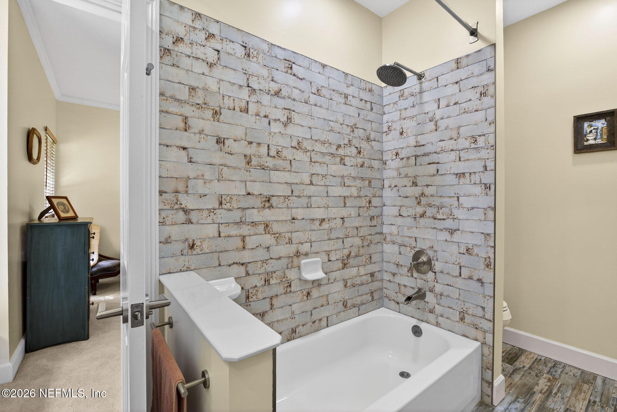 7914 Mc Laurin Road North Jacksonville, FL 32256 - Photo 24 of 44 a bathroom with a bathtub and shower