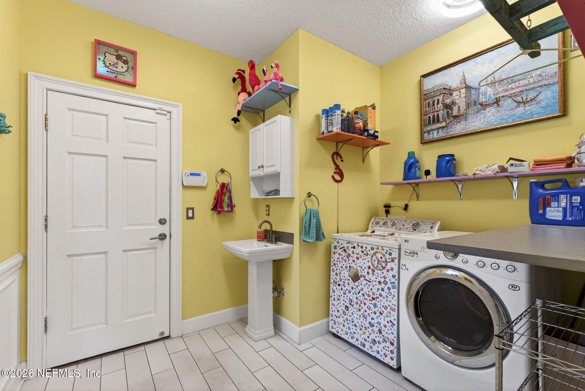 7914 Mc Laurin Road North Jacksonville, FL 32256 - Photo 28 of 44 a utility room with dryer and washer