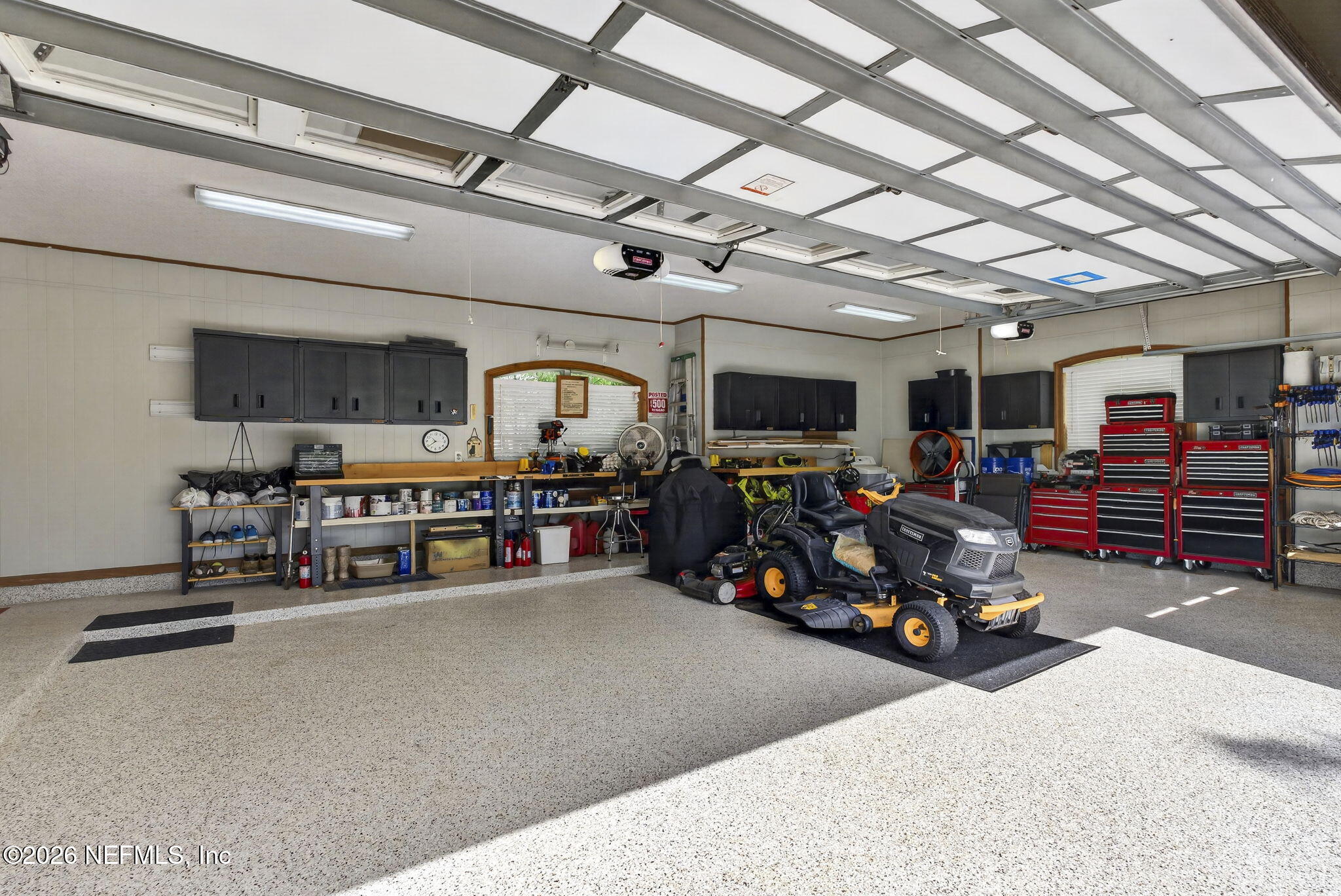 7914 Mc Laurin Road North Jacksonville, FL 32256 - Photo 31 of 44 a view of a storage room with gym equipment