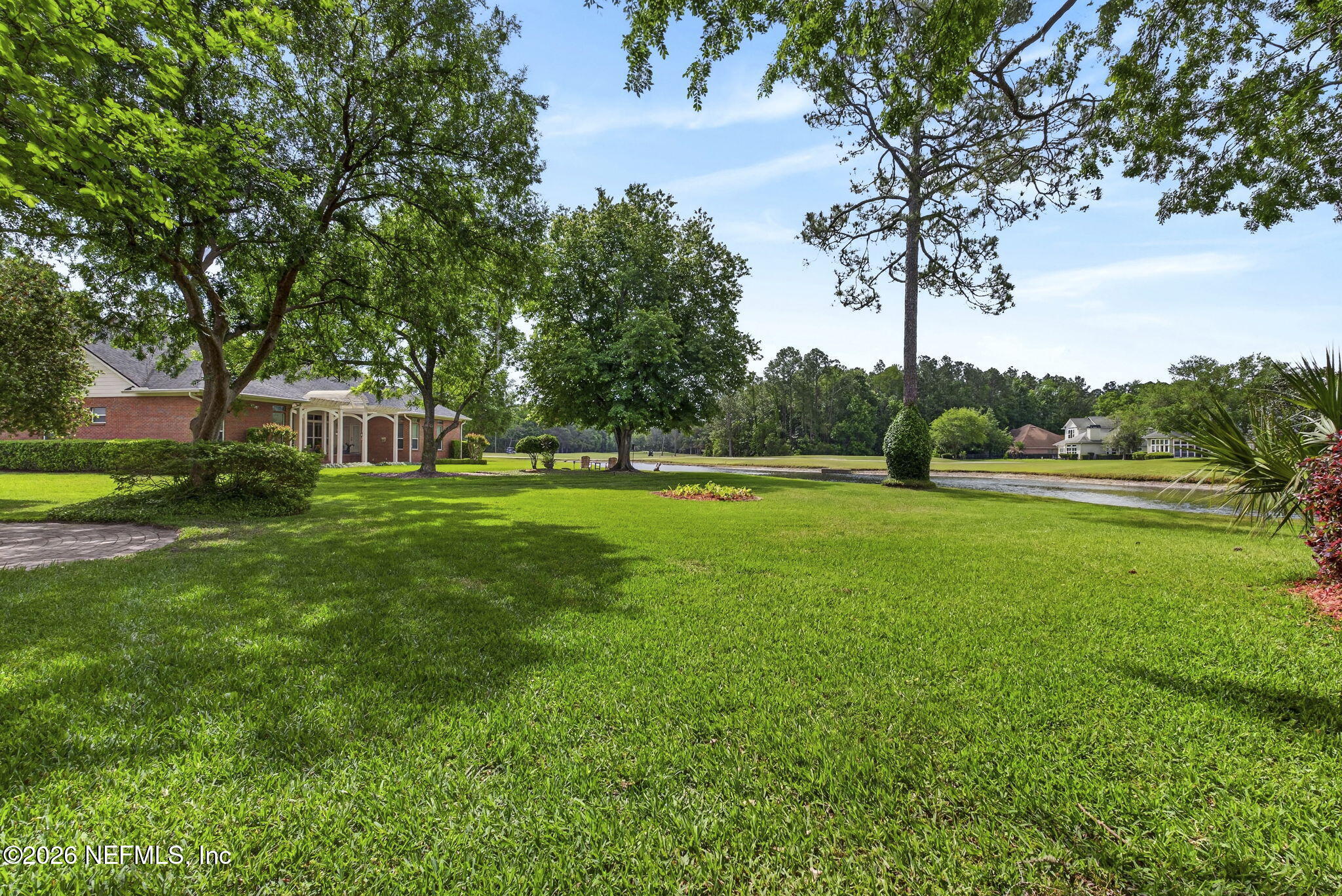 7914 Mc Laurin Road North Jacksonville, FL 32256 - Photo 35 of 44 a view of a park with large trees