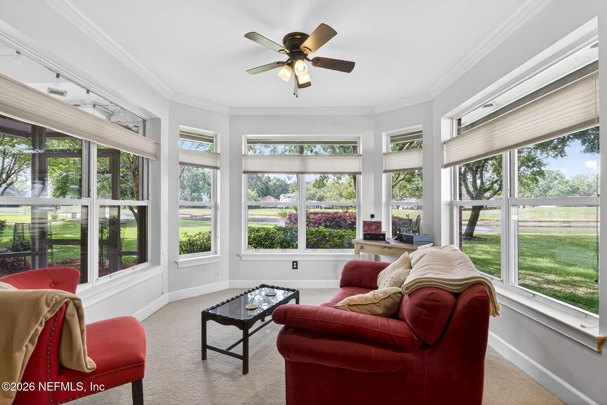 7914 Mc Laurin Road North Jacksonville, FL 32256 - Photo 5 of 44 a living room with furniture and a large window