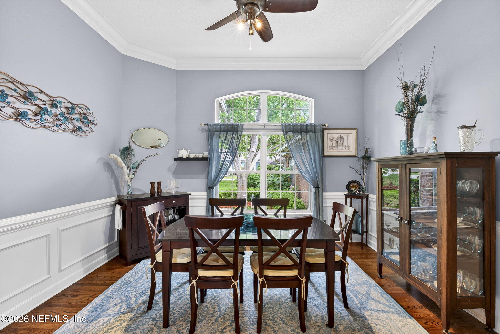 7914 Mc Laurin Road North Jacksonville, FL 32256 - Photo 9 of 44 a view of a dining room with furniture window and wooden floor