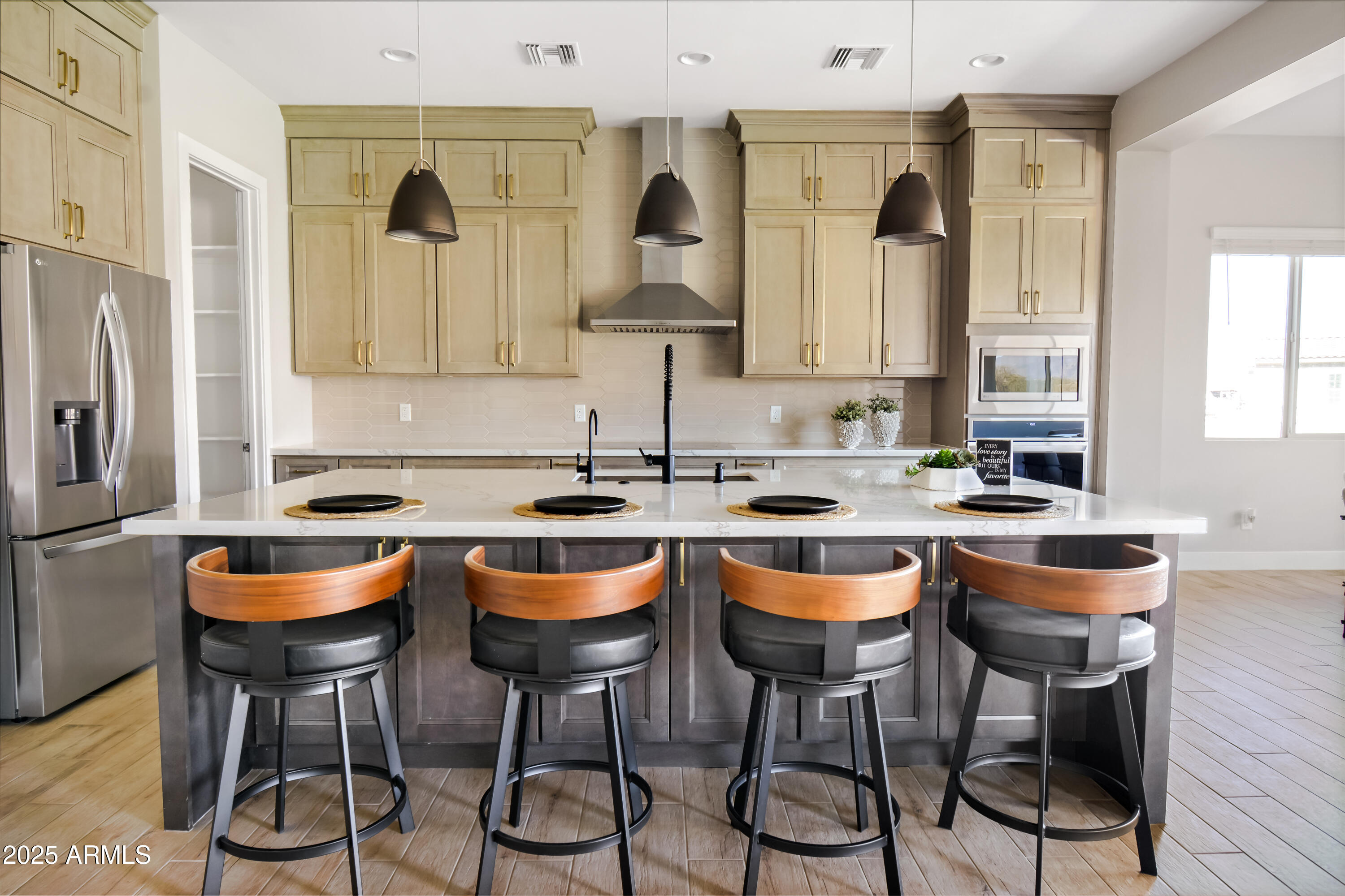 2775 South Baker Apache Junction, AZ 85118 - Photo 12 of 47 a kitchen with stainless steel appliances a sink and a stove
