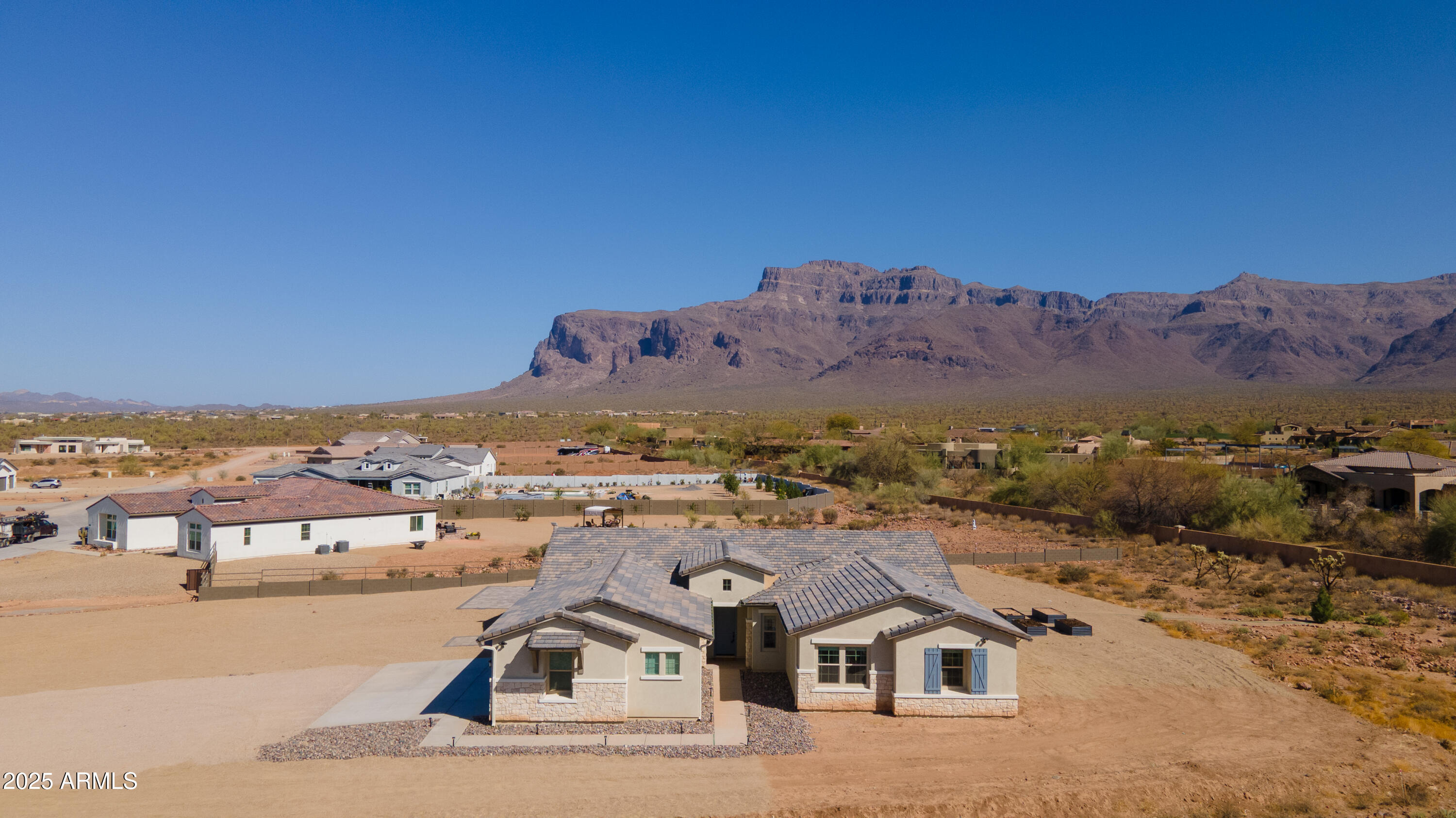2775 South Baker Apache Junction, AZ 85118 - Photo 3 of 47 an aerial view of residential houses and outdoor space
