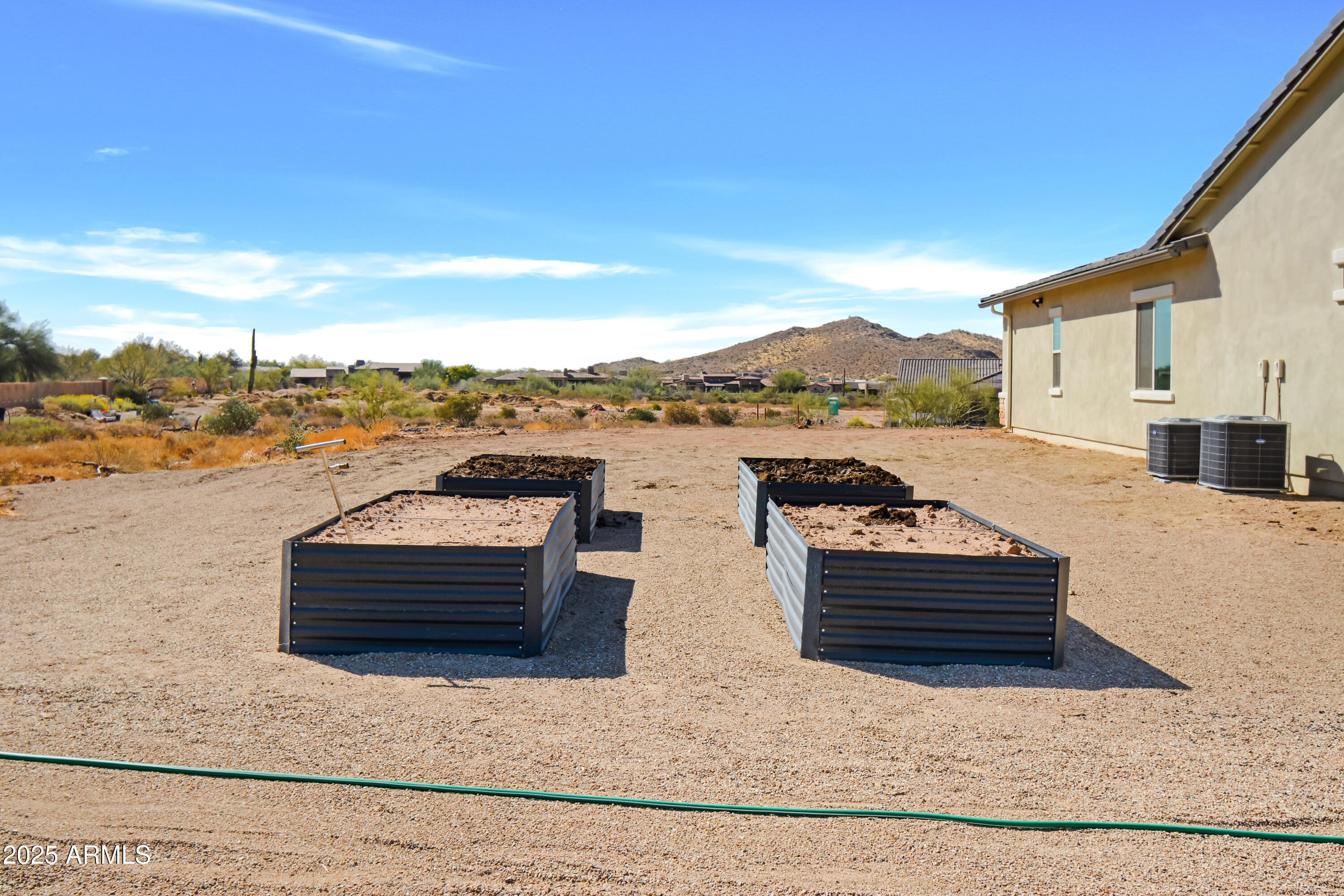 2775 South Baker Apache Junction, AZ 85118 - Photo 42 of 47 a picture of table and chairs on the terrace