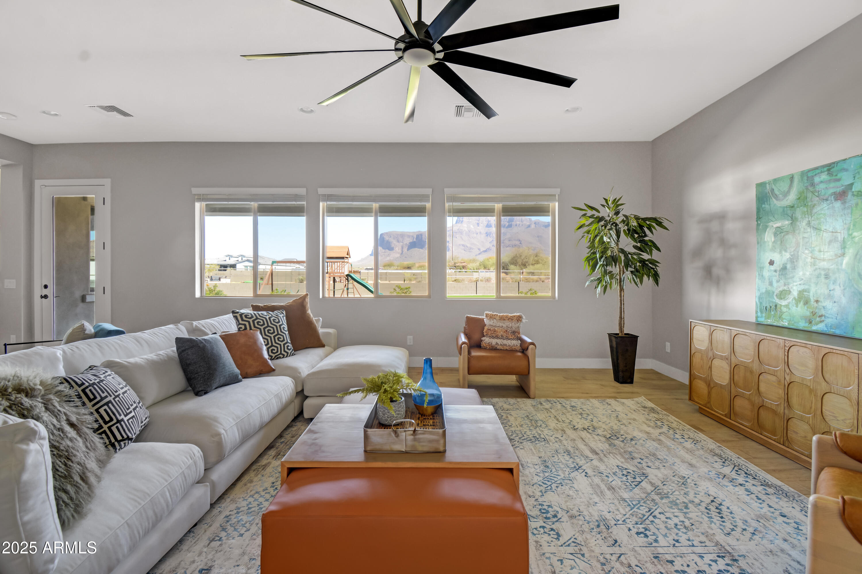 2775 South Baker Apache Junction, AZ 85118 - Photo 8 of 47 a living room with furniture and a large window