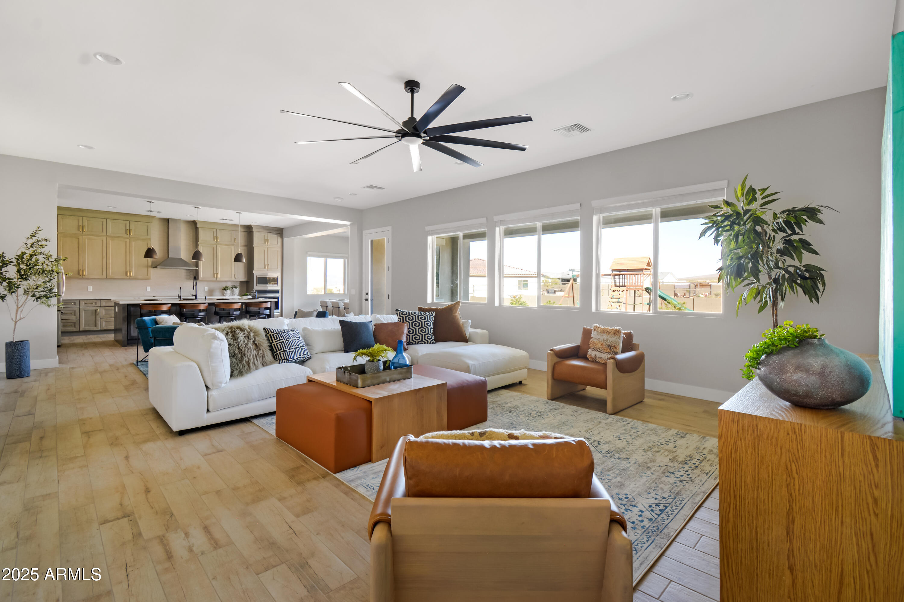 2775 South Baker Apache Junction, AZ 85118 - Photo 10 of 47 a living room with furniture and a large window