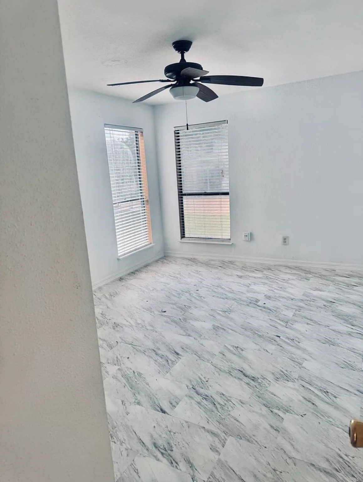 16111 Aspenglenn Drive, Unit 407 Houston, TX 77084 - Photo 12 of 15 a view of an empty room and a window