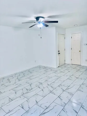 a view of a room & utility room