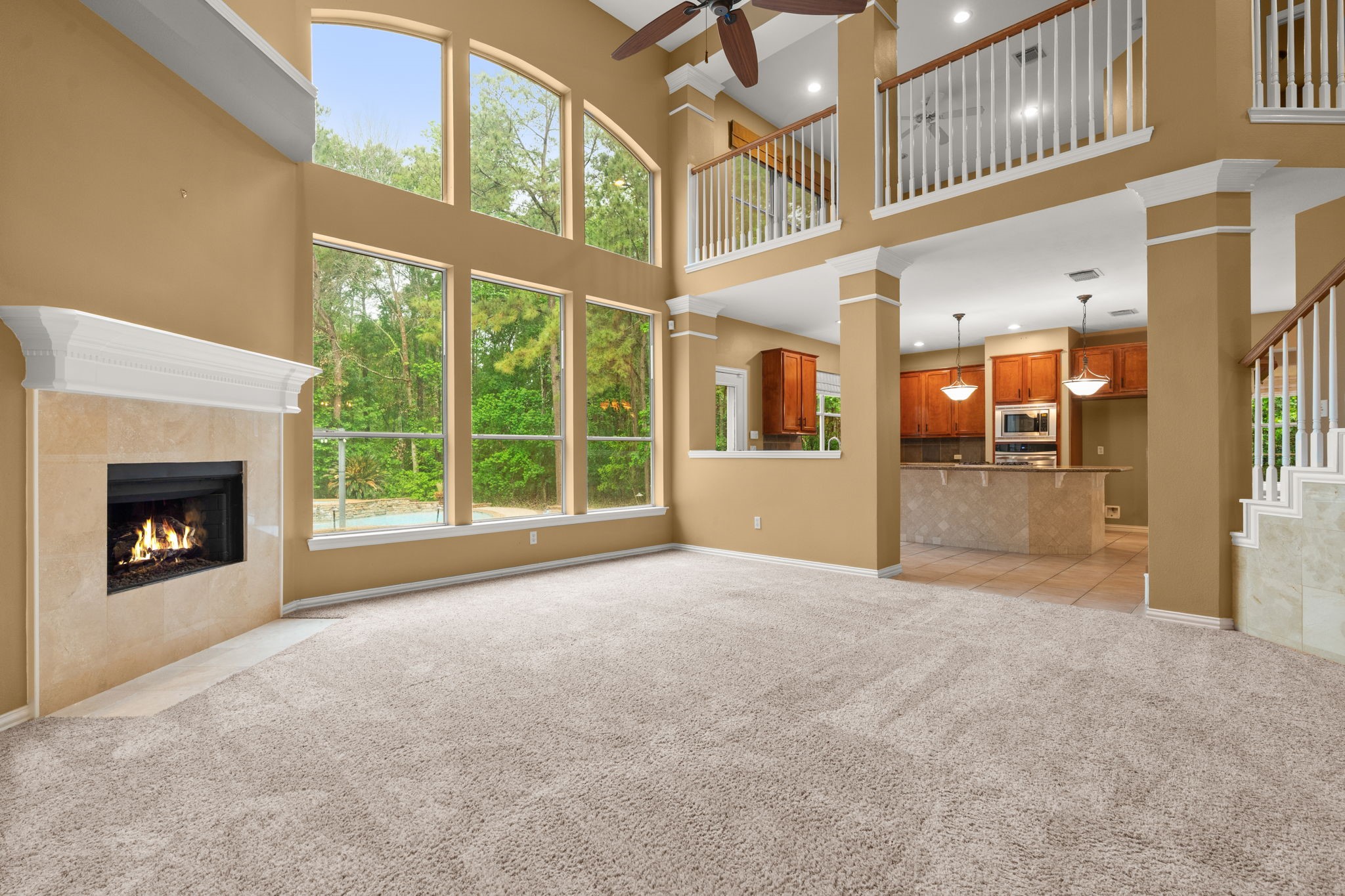 13258 Overlook Court Conroe, TX 77302 - Photo 13 of 49 Additional view of living room looking out to the backyard.