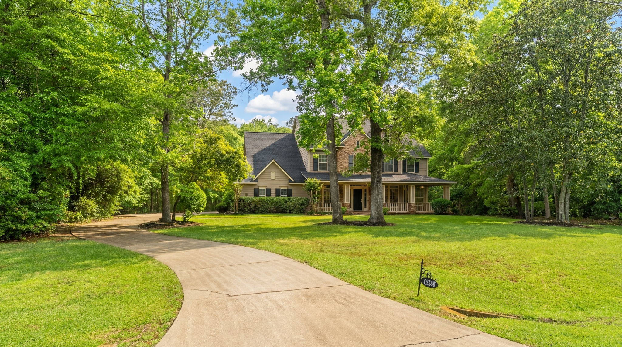 13258 Overlook Court Conroe, TX 77302 - Photo 2 of 49 Nice and peaceful, surrounded by trees. It's a tranquil spot with a great nature connection.