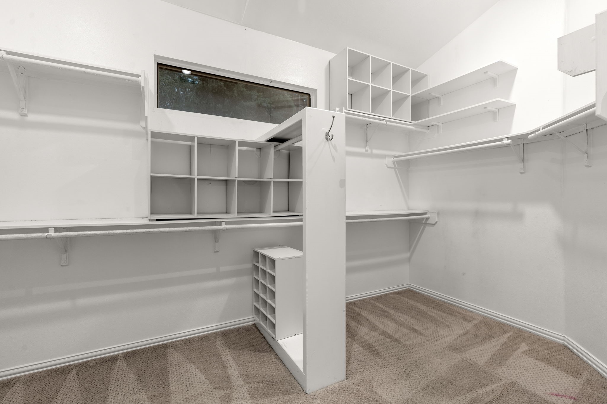 13258 Overlook Court Conroe, TX 77302 - Photo 26 of 49 Large walk in closet located in the primary bathroom.