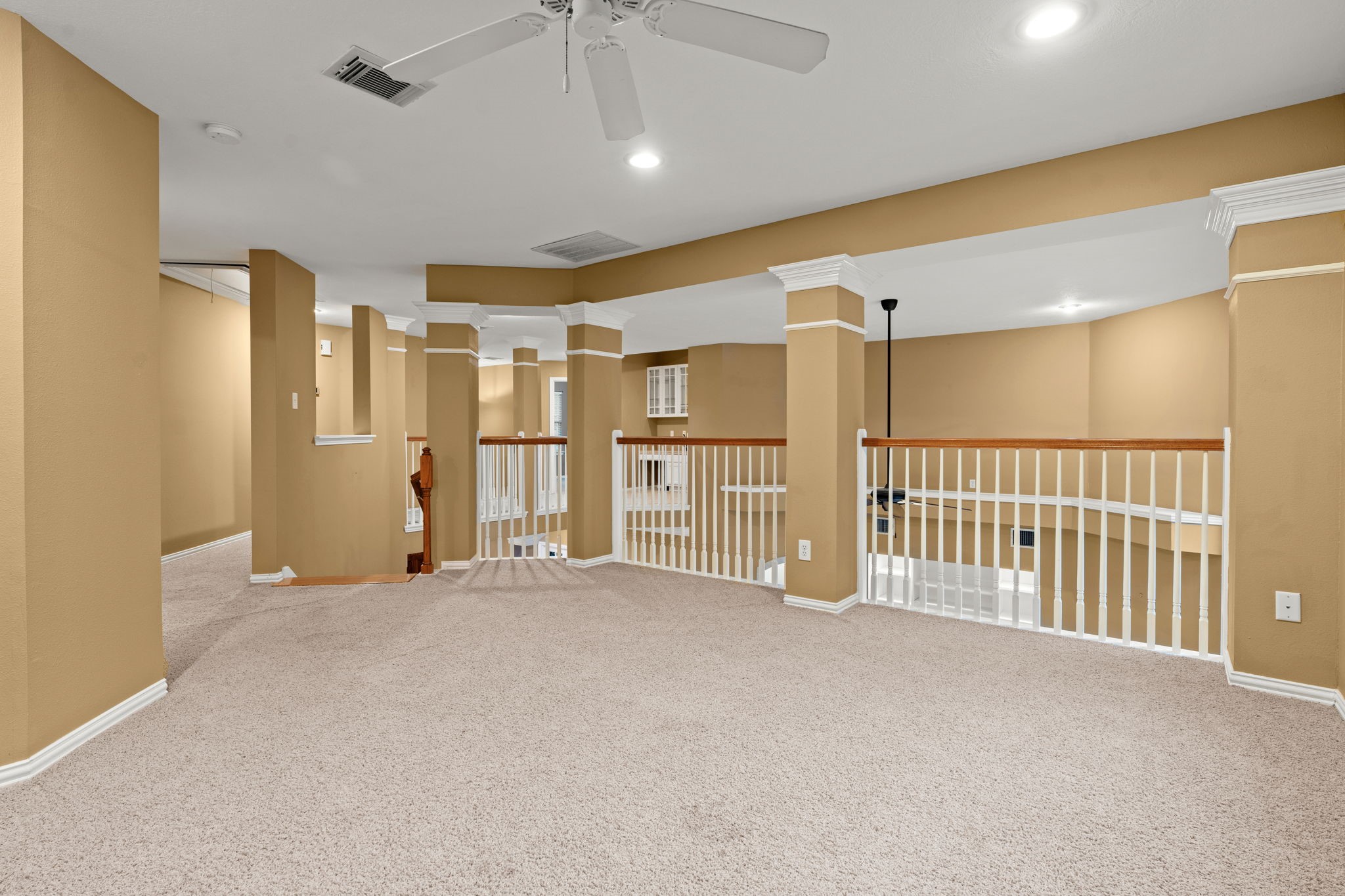 13258 Overlook Court Conroe, TX 77302 - Photo 30 of 49 View of game room looking into hallway to additional bedrooms.