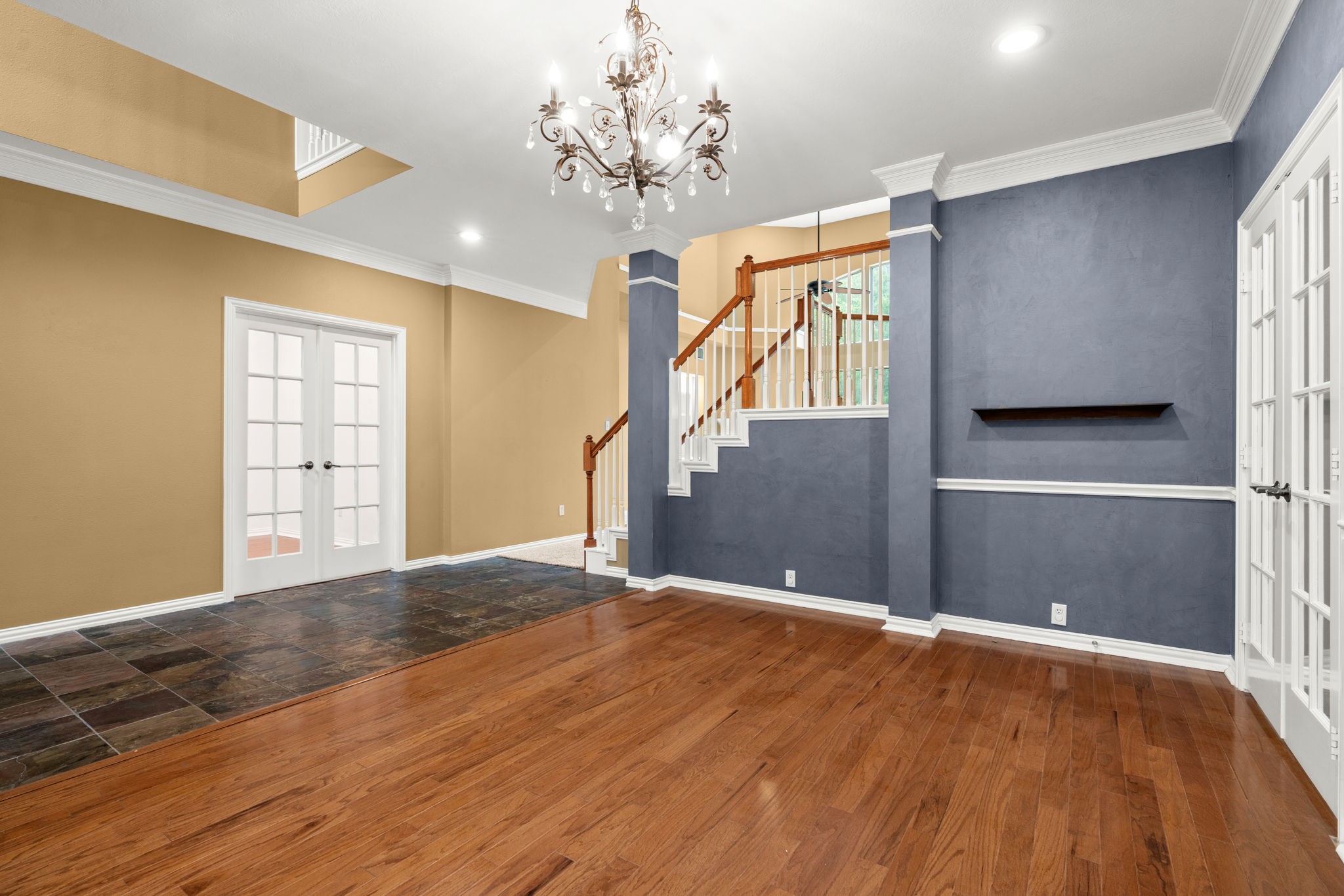 13258 Overlook Court Conroe, TX 77302 - Photo 7 of 49 Formal dining room with view into entry and home office.