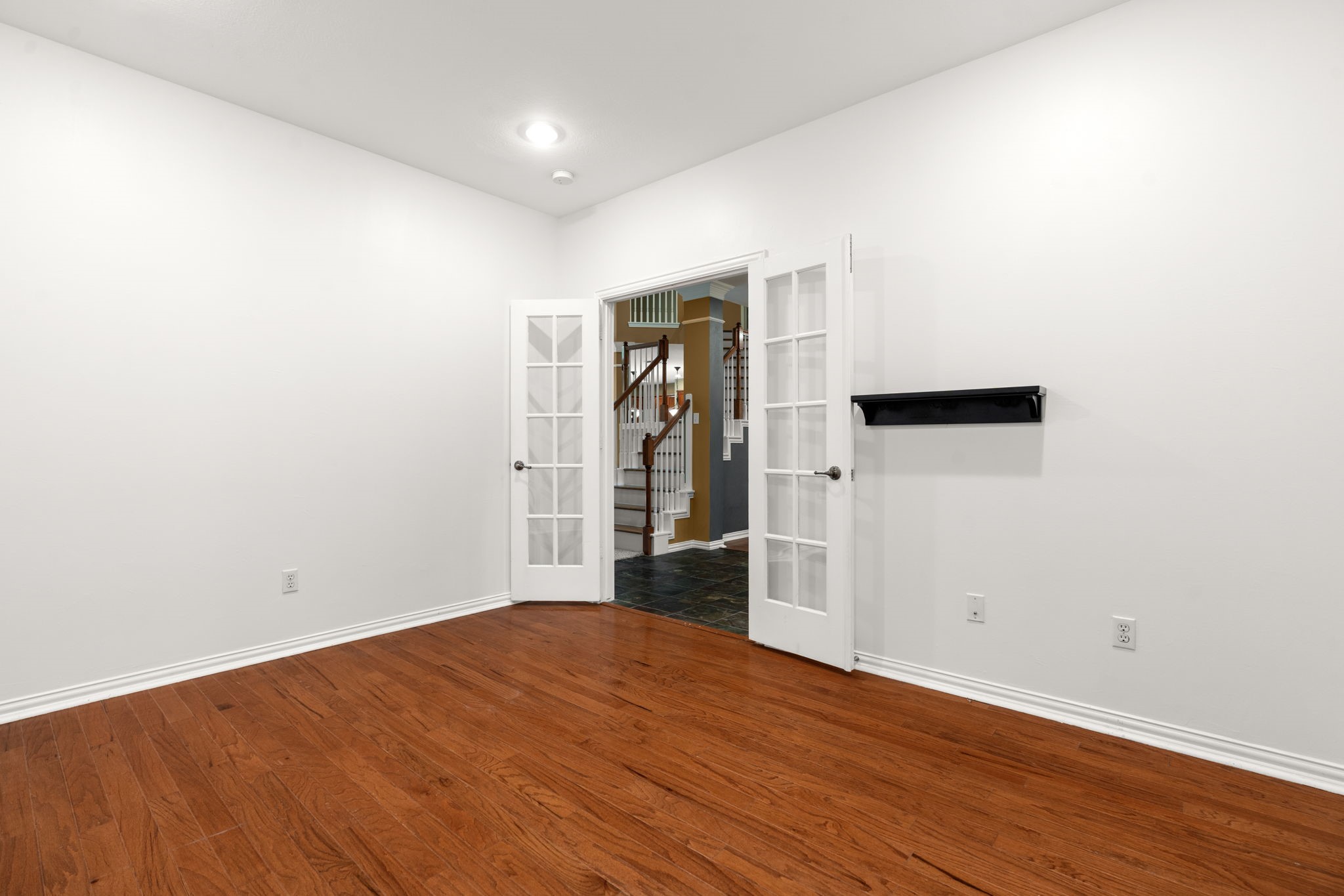 13258 Overlook Court Conroe, TX 77302 - Photo 9 of 49 Home office with view into the entry.